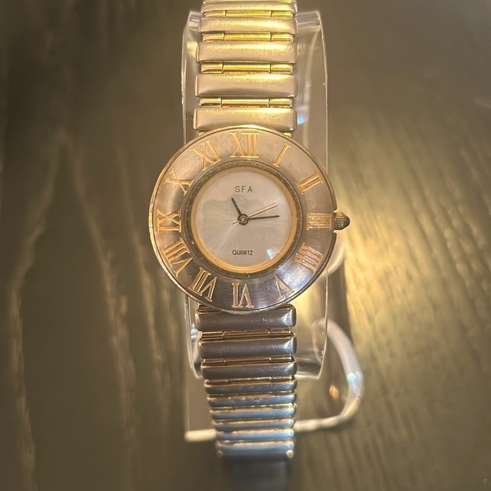 Saks Fifth Avenue, two tone vintage watch. Pre-loved in good condition.